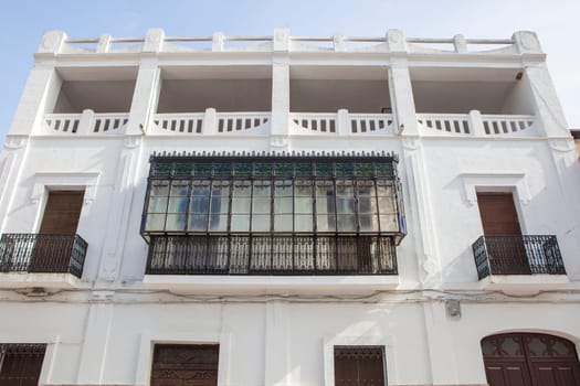 19th Century stained-glass balcony. Alcantara streets old town, Caceres, Extremadura, Spain