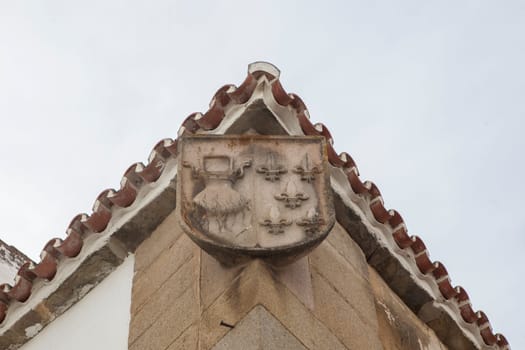 Oviedo house or Calderones House emblem. Alcantara streets old town, Caceres, Extremadura, Spain