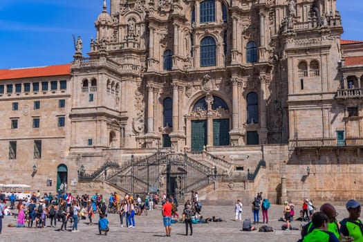 Santiago de Compostela, Spain: April 05, 2023. Main Square at the Cathedral of Santiago and Obradoiro Square. Tourists and pilgrims