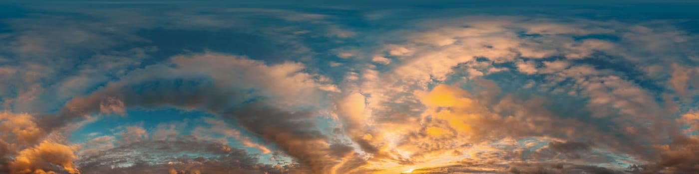 Bright sunset sky panorama with Cirrus clouds. Seamless hdr spherical equirectangular 360 panorama. Sky dome or zenith for 3D visualization, game and sky replacement for aerial drone 360 panoramas.