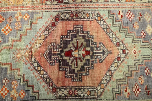 Textures and patterns in color from woven carpets