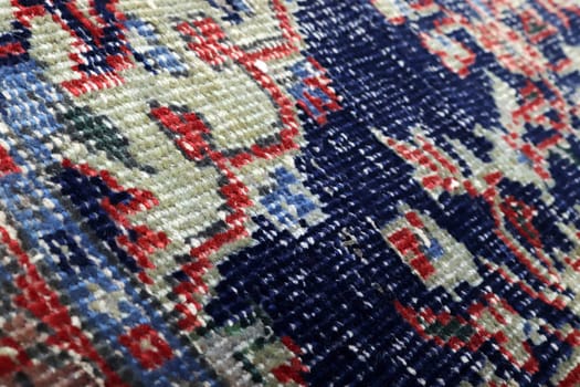Textures and patterns in color from woven carpets