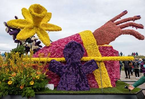 Noordwijk, Netherlands - April 22, 2023: Spectacular flower covered floats in the Bloemencorso Bollenstreek the annual spring flower parade from Noordwijk to Haarlem in the Netherlands.