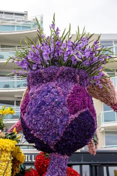 Noordwijk, Netherlands - April 22, 2023: Spectacular flower covered floats in the Bloemencorso Bollenstreek the annual spring flower parade from Noordwijk to Haarlem in the Netherlands.