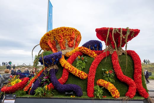 Noordwijk, Netherlands - April 22, 2023: Spectacular flower covered floats in the Bloemencorso Bollenstreek the annual spring flower parade from Noordwijk to Haarlem in the Netherlands.