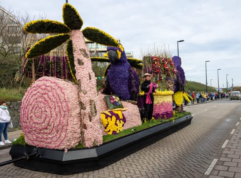 Noordwijk, Netherlands - April 22, 2023: Spectacular flower covered floats in the Bloemencorso Bollenstreek the annual spring flower parade from Noordwijk to Haarlem in the Netherlands.