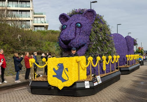Noordwijk, Netherlands - April 22, 2023: Spectacular flower covered floats in the Bloemencorso Bollenstreek the annual spring flower parade from Noordwijk to Haarlem in the Netherlands.