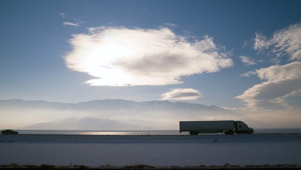 Semi Truck Travels Highway Over Salt Flats Freight Transport