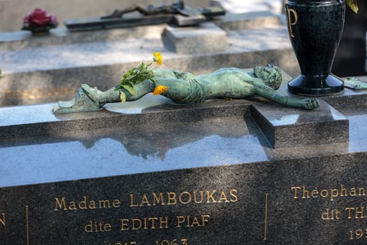 PARIS, FRANCE - SEPT 12, 2014: Edith Piaf grave in Pere-Lachaise cemetery, Paris, France