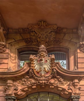 Sandstone city coat of arms above the entrance of a house in Kaiserstrasse, Frankfurt, Germany