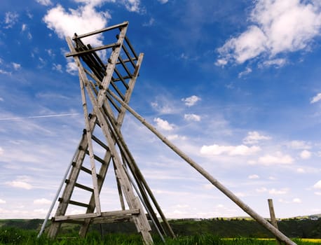 high seat at a yellow rapeseed field