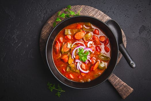 Traditional Solyanka soup - thick and sour soup of Russian origin