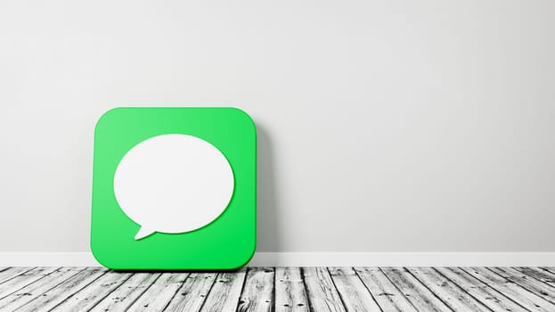Messages App Icon 3D Symbol Shape on Wooden Floor Against Gray Wall with Copy Space 3D Render Illustration