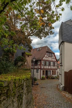 small street with half timbered houses in the historical old town, Kronberg im Taunus, Germany