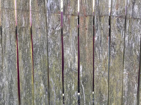 rustic wooden old unpainted wooden board fence