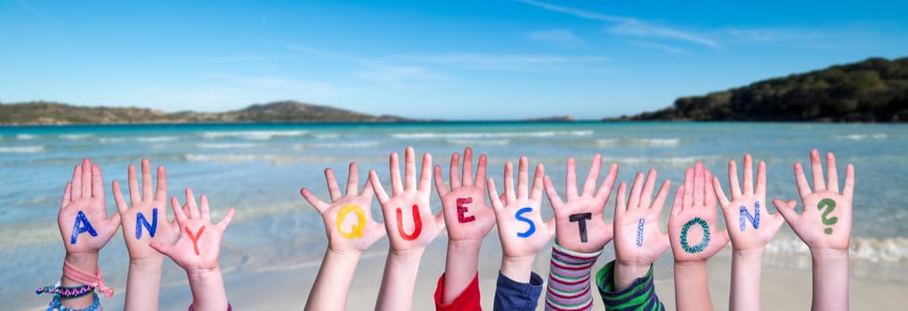 Children Hands Building Colorful English Word Any Question. Summer Ocean, Sea And Beach As Background