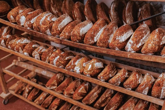 Organic Bakery - details of baker baking bread handmade