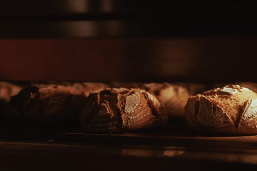 Organic Bakery - details of baker baking bread handmade
