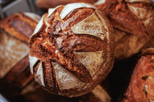 Organic Bakery - details of baker baking bread handmade