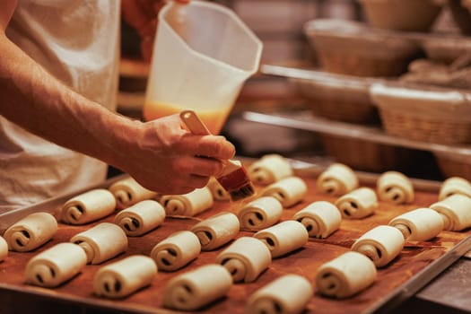 Organic Bakery - details of baker baking bread handmade