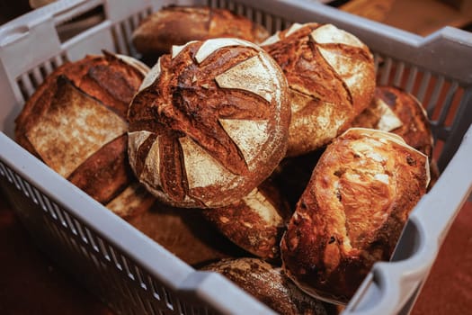 Organic Bakery - details of baker baking bread handmade