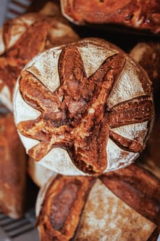 Organic Bakery - details of baker baking bread handmade