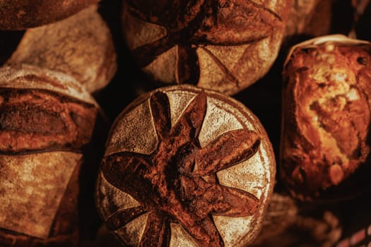 Organic Bakery - details of baker baking bread handmade