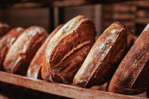 Organic Bakery - details of baker baking bread handmade