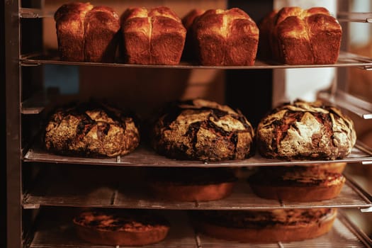 Organic Bakery - details of baker baking bread handmade