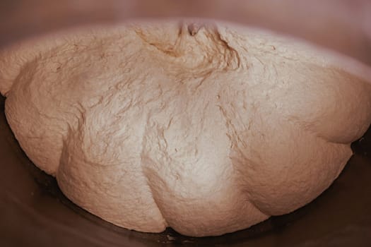 Organic Bakery - details of baker baking bread handmade