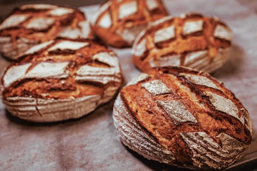 Organic Bakery - details of baker baking bread handmade