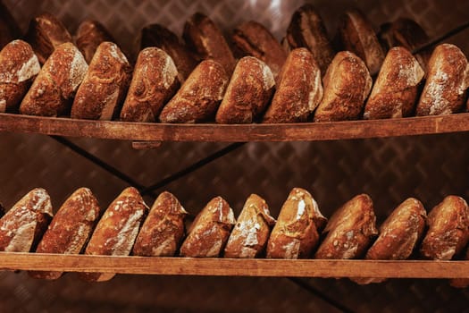 Organic Bakery - details of baker baking bread handmade