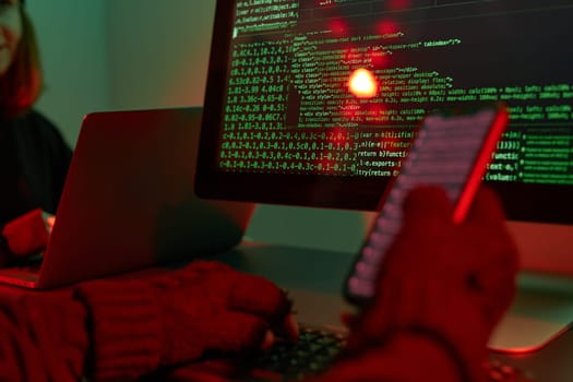 Anonymous people using computer and programming to break code. Cyber security threat. Internet and network security. Access to private information. Anonymous hackers using technology to access to password and encrypted data. Cyber attack