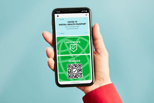 Digital covid certificate. Covid negative rapid digital test pass. Woman passenger holding digital medical pass on her mobile phone and airplane ticket. Traveler showing digital covid test result as medical pass for travel during covid-19 pandemic