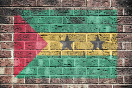 A Sao Tome and Principe flag on old brick wall background
