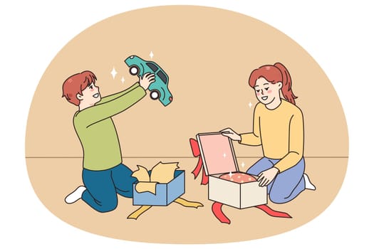 Happy small kids unpack wrapped boxes with presents for birthday. Smiling children feel excited open unbox parcels or gifts for special occasion. Surprise concept. Childcare. Vector illustration.