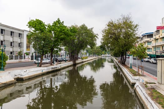 Bangkok,Thailand - April 16, 2023: The Khlong Rop Krung is a historical canal in Bangkok. Known for its beautiful scenery and traditional way of life. It's a great place to explore the city's cultural