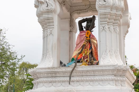 Bangkok,Thailand - April 16,2023: Thokkathan-Mother Earth Squeezing Her Hair is a shrine located on Ratchadamnoen Nai Road. Near Rattanakosin Hotel and Phan Phiphob Leela Bridge can pay homage anytime