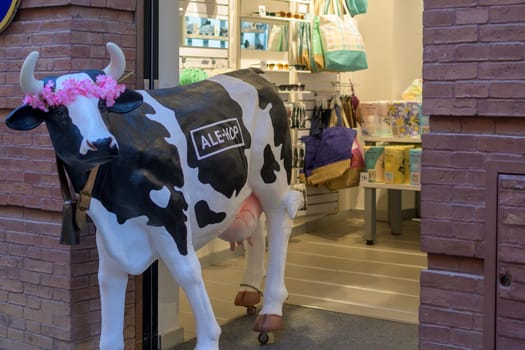 Malaga, Spain, April 2023, Illustrative Editorial: View on the Cow mascot of Ale-Hop chain stores