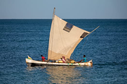 NOSY ISLAND, MADAGASCAR - NOVEMBER 22, 2022: Fishermen using sailboats to fish off the coast of Nosy Island in Madagascar. The primary source of livelihood in Anakao is fishing.