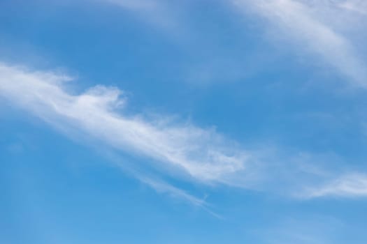 The sky is blue with some clouds passing over it, making it a good background.