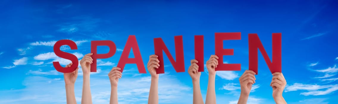 People Or Persons Hands Building German Word Spanien Means Spain. Summer Ocean, Sea And Beach As Background.