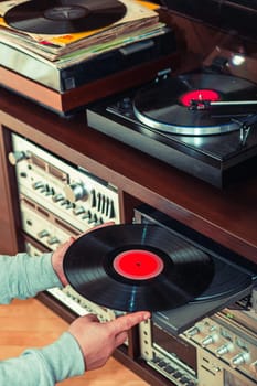 Set of audio equipment, record players, amplifiers, radio and vinyl records