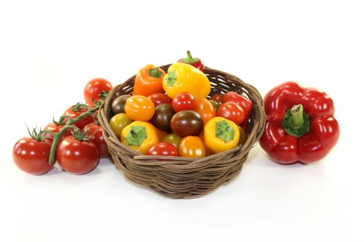 Tomatoes and peppers in a small basket