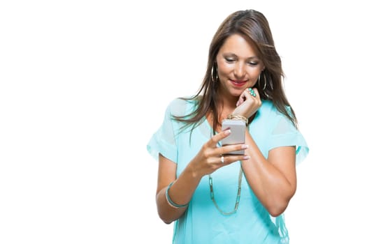 Young attractive brunette woman with smartphone phone isolated against white background with text space