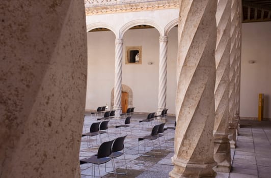 Valladolid, Spain - July 19th, 2020: Colegio de San Gregorio courtyard ground floor. Isabelline style building, Valladolid, Spain