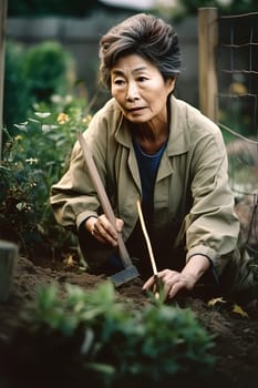 A 50-year-old Asian woman is planting flowers in her backyard garden. (generative AI)