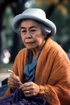 A 50-year-old Mexican woman is depicted knitting in a park surrounded by nature (generative AI)