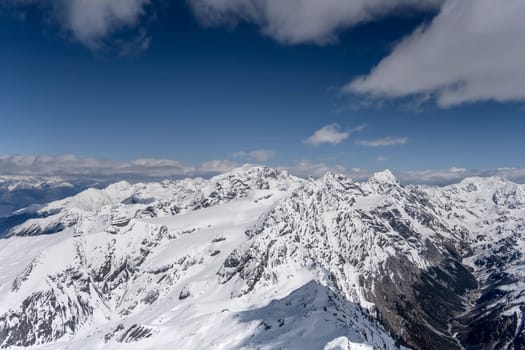 aerial landscape, from a glider plane, of Stelvio ski area and Zebru' valley, shot from west in bright late spring light, Sondrio, Italy