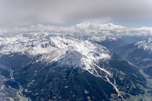 aerial landscape, from a glider plane, of Sobretta and Vallecetta peaks, shot from west in bright late spring light, Sondrio, Italy